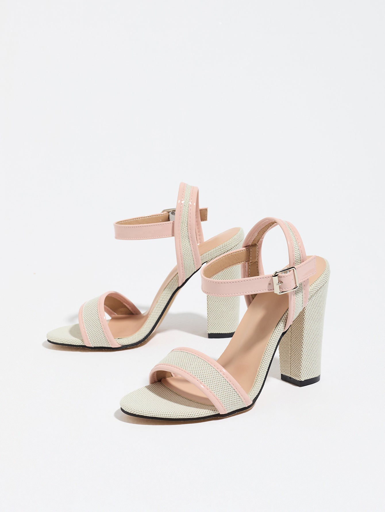Mescini pink block heel ankle strap sandals, angled view of one shoe on white, US women's sizes