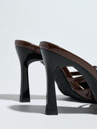 Mescini brown bow pointed toe stiletto mules, rear view of the two heels, US women's sizes