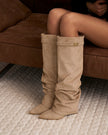 Mescini beige slouchy knee high boots, angled pair view on a pale floor, US sizes