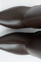 Mescini dark brown fold over knee high boots, close view of the shaft seam and fold, US sizes