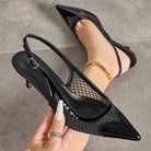 Mescini - Black mesh slingback kitten heels held in hand, insole and strap, US women's sizes