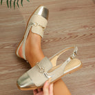 Mescini – gold cap toe flat slingback sandal shown from the outer side, US women's sizes