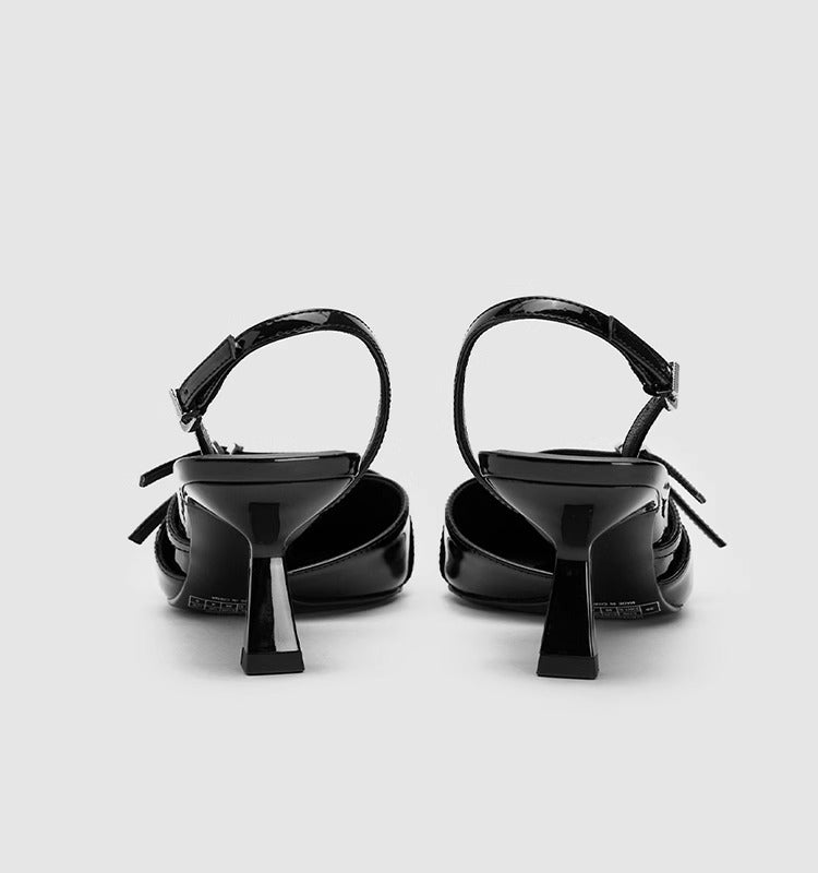 Mescini black patent pointed toe kitten heels, rear view of the pair with slingback straps, US women's sizes