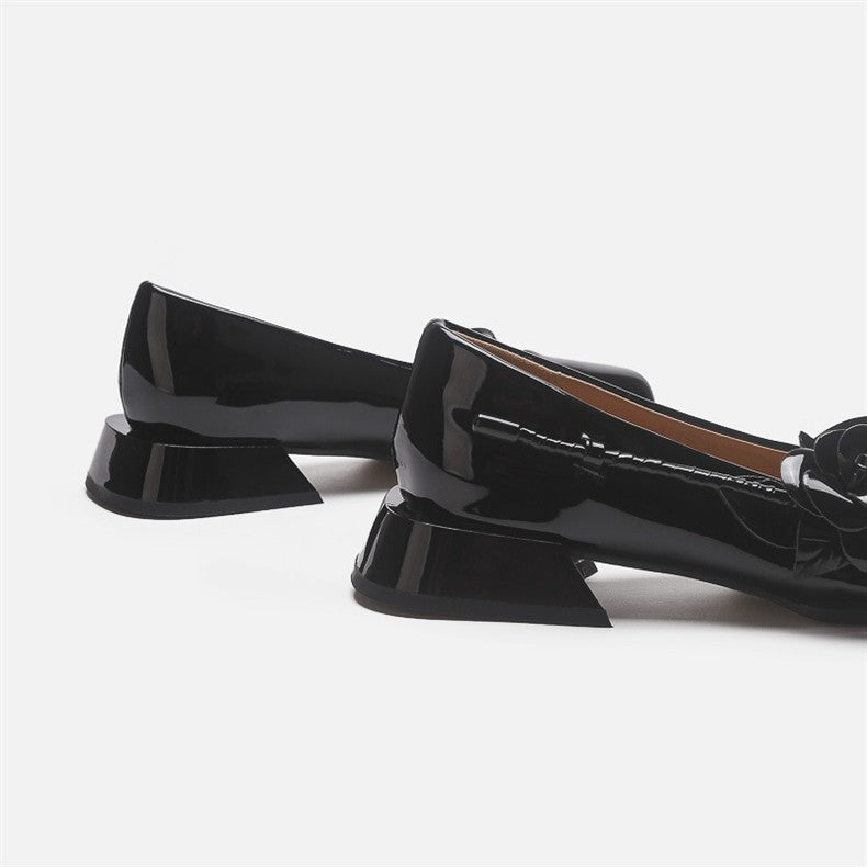 Mescini black rose square toe mary jane heels, low rear view of the two flared blocks, US women's sizes