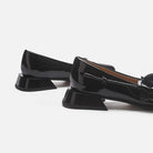 Mescini black rose square toe mary jane heels, low rear view of the two flared blocks, US women's sizes