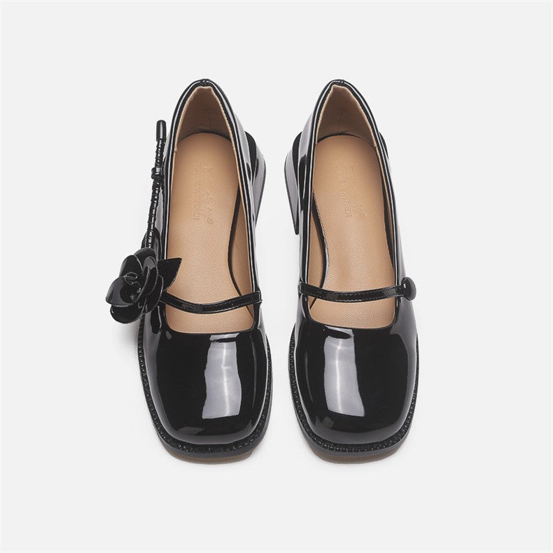 Mescini black rose square toe mary jane heels, the pair upright and seen from the front, US women's sizes
