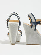 Mescini navy blue canvas platform wedge sandals, seen from behind at an angle, US women's sizes