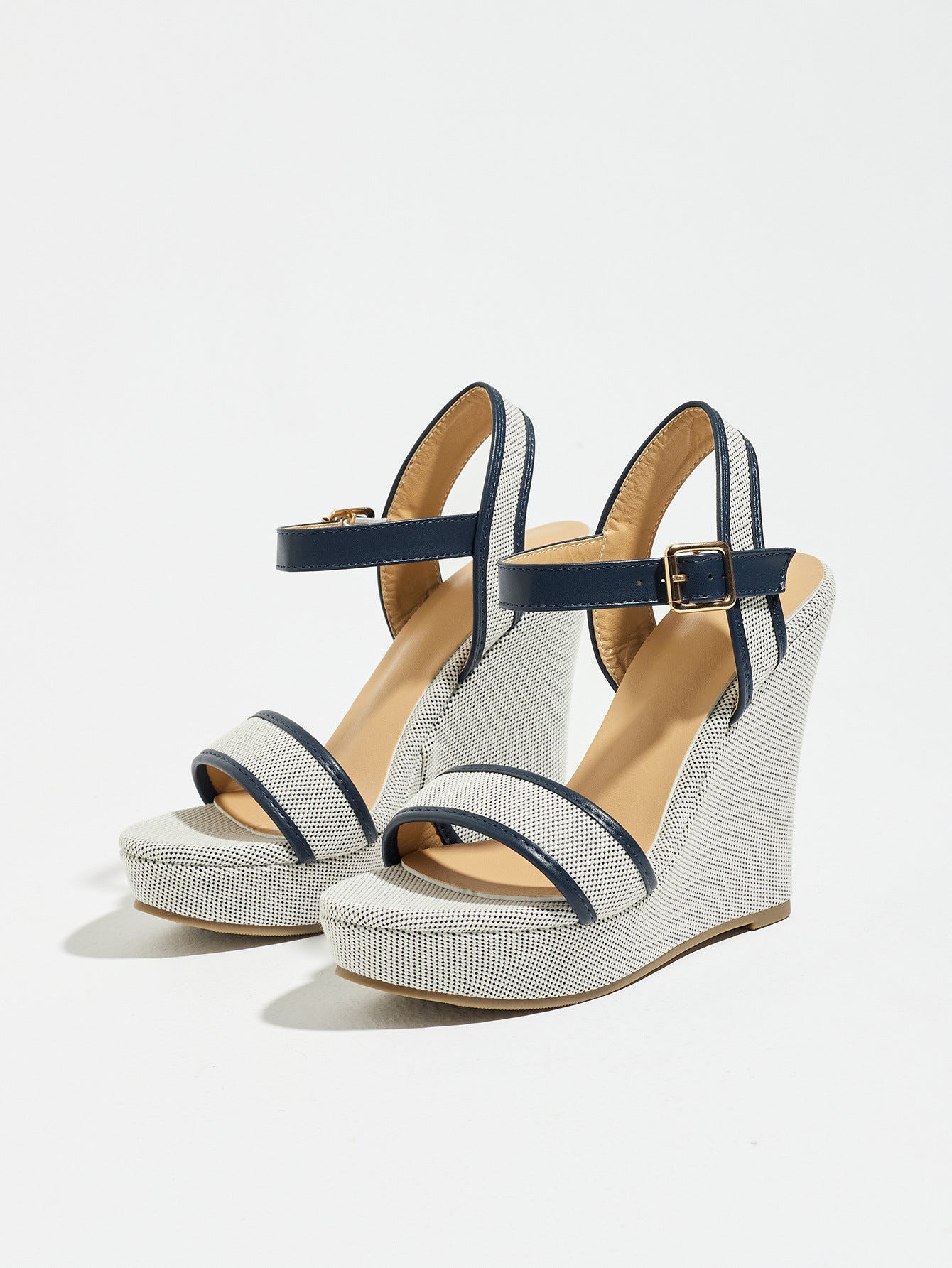Mescini navy blue canvas platform wedge sandals, angled view of the pair on white, US women's sizes