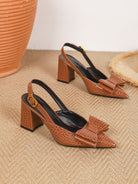 Mescini caramel croc print bow slingback block heels, pair angled on the floor, US women's sizes