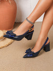 Mescini blue croc print bow slingback block heels worn on the model, side view, US women's sizes