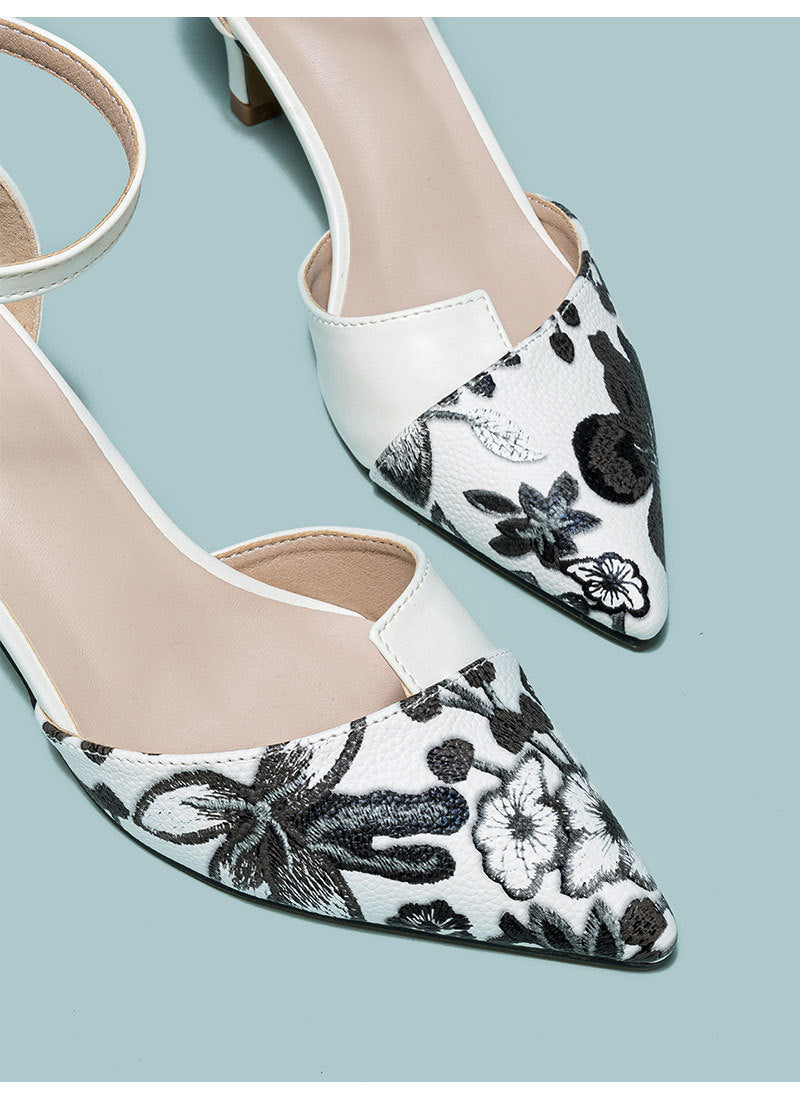 Mescini white embroidered floral ankle strap pumps, close up of the stitched toes, US women's sizes