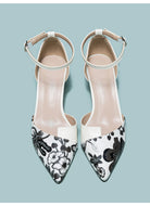 Mescini white embroidered floral ankle strap pumps, pair seen from directly above, US women's sizes