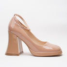 Mescini nude ankle strap platform block heel pumps, single shoe seen from the side, US women's sizes