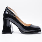 Mescini black ankle strap platform block heel pumps, single shoe in side profile on white, US women's sizes
