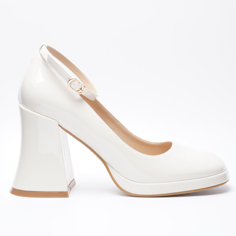 Mescini white ankle strap platform block heel pumps, single shoe photographed in profile, US women's sizes