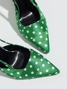 Mescini green polka dot slingback stiletto heels, close up of the pointed satin toes, US women's sizes