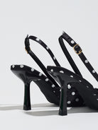 Mescini black polka dot slingback stiletto heels, rear view of the buckle and back strap, US women's sizes