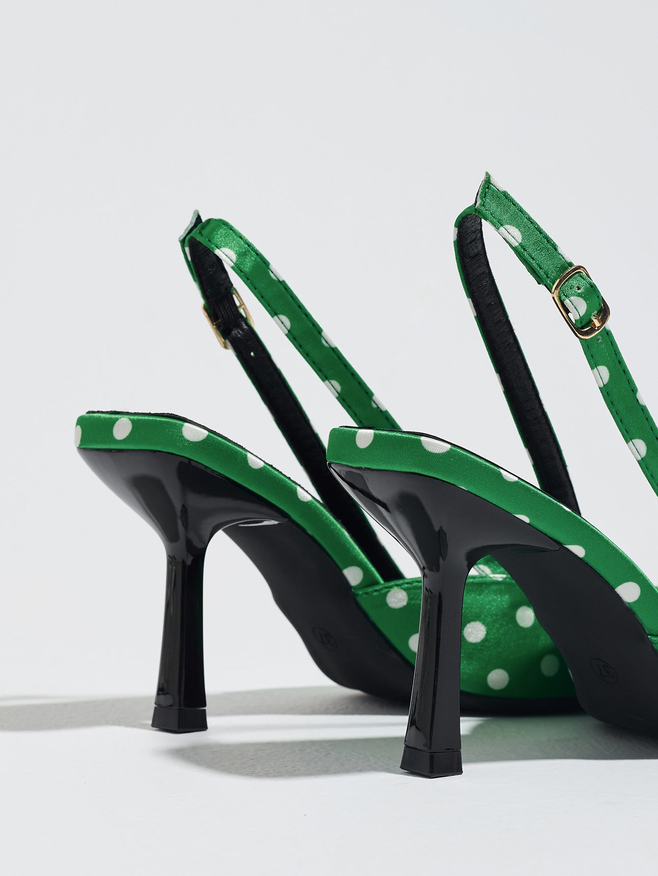 Mescini green polka dot slingback stiletto heels, back view of the strap and buckle, US women's sizes