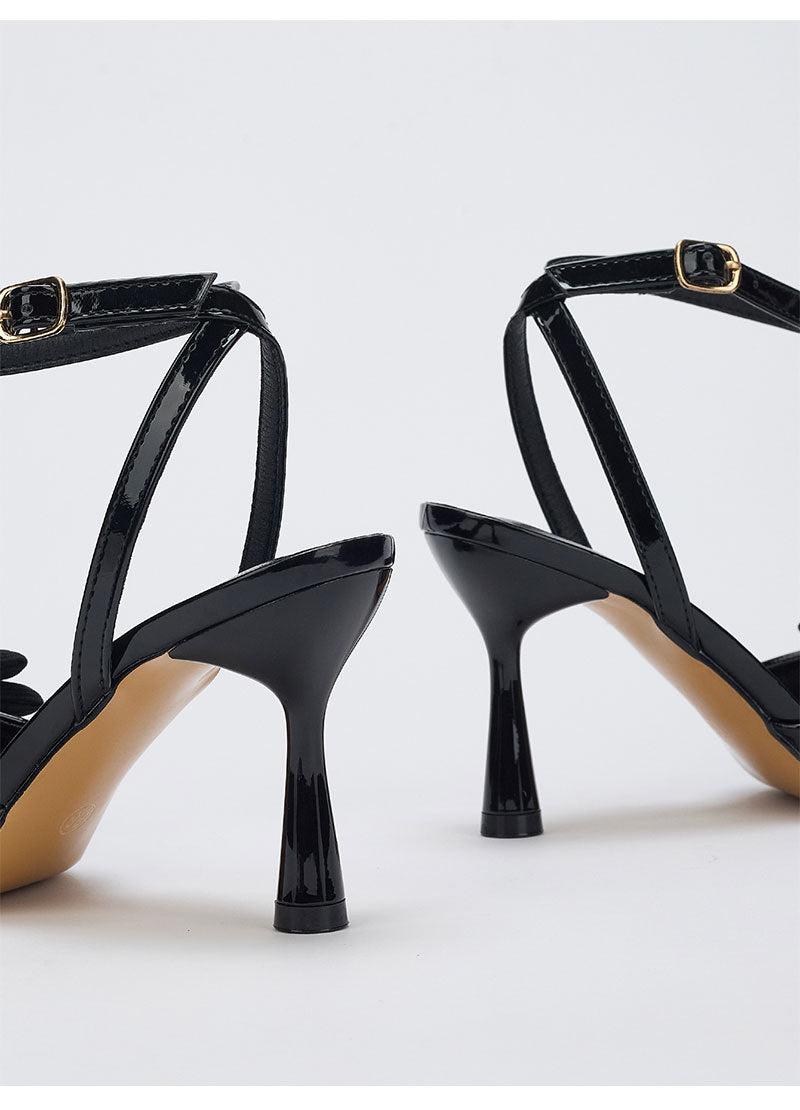 Mescini – Black bow ankle strap pumps seen from behind, flared heels, US women's sizes