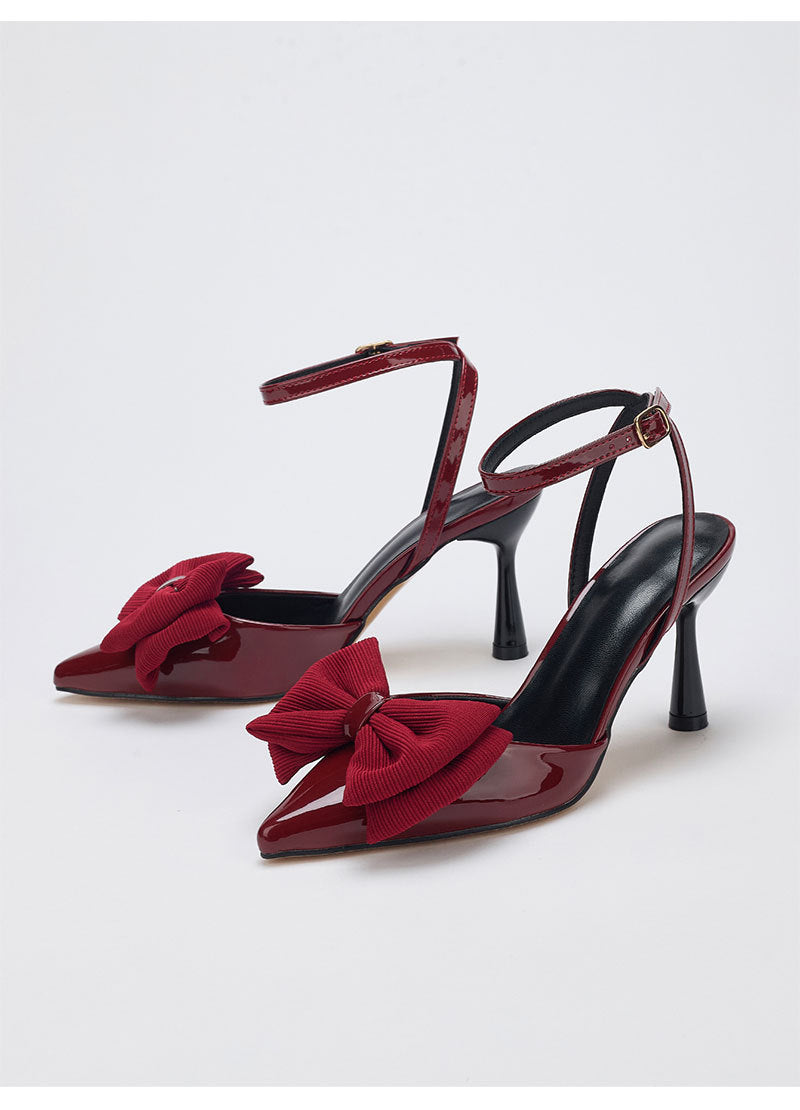 Mescini – Burgundy bow pointed toe ankle strap pumps, angled studio pair, US women's sizes