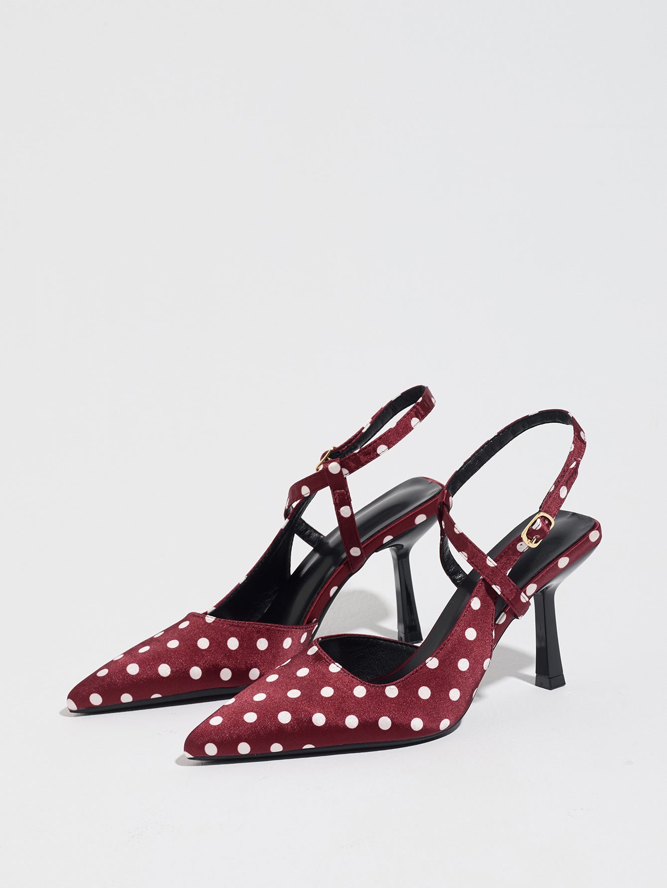 Mescini burgundy polka dot pointed toe slingback heels, angled pair on white, US women's sizes