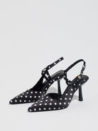 Mescini black polka dot pointed toe slingback heels, angled pair on white, US women's sizes