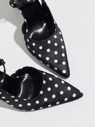 Mescini black polka dot slingback heels, close view of the two pointed toes, US women's sizes