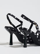 Mescini black polka dot slingback heels, rear view of the standing pair, US women's sizes