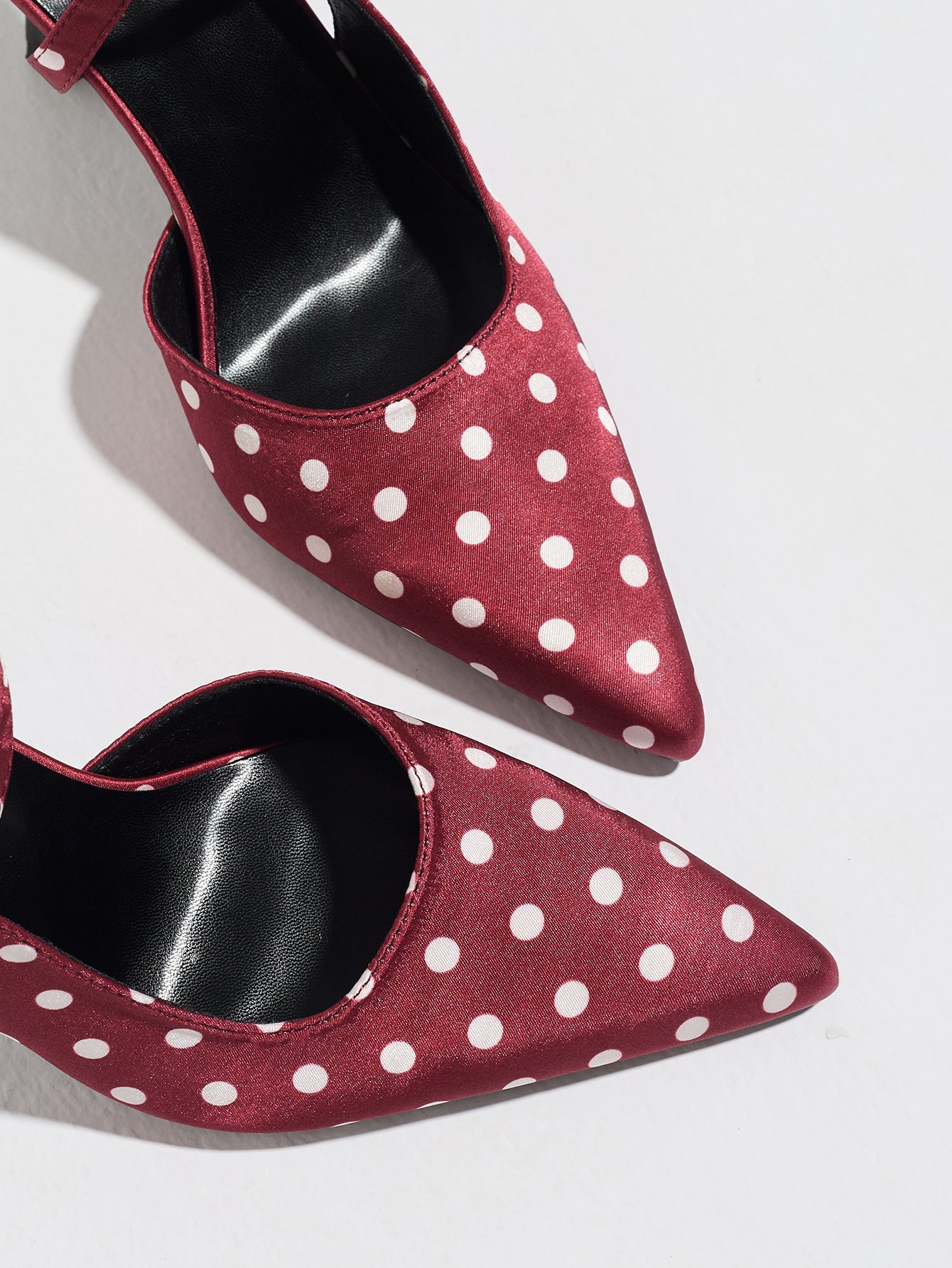 Mescini burgundy polka dot slingback heels, close view of the two pointed toes, US women's sizes