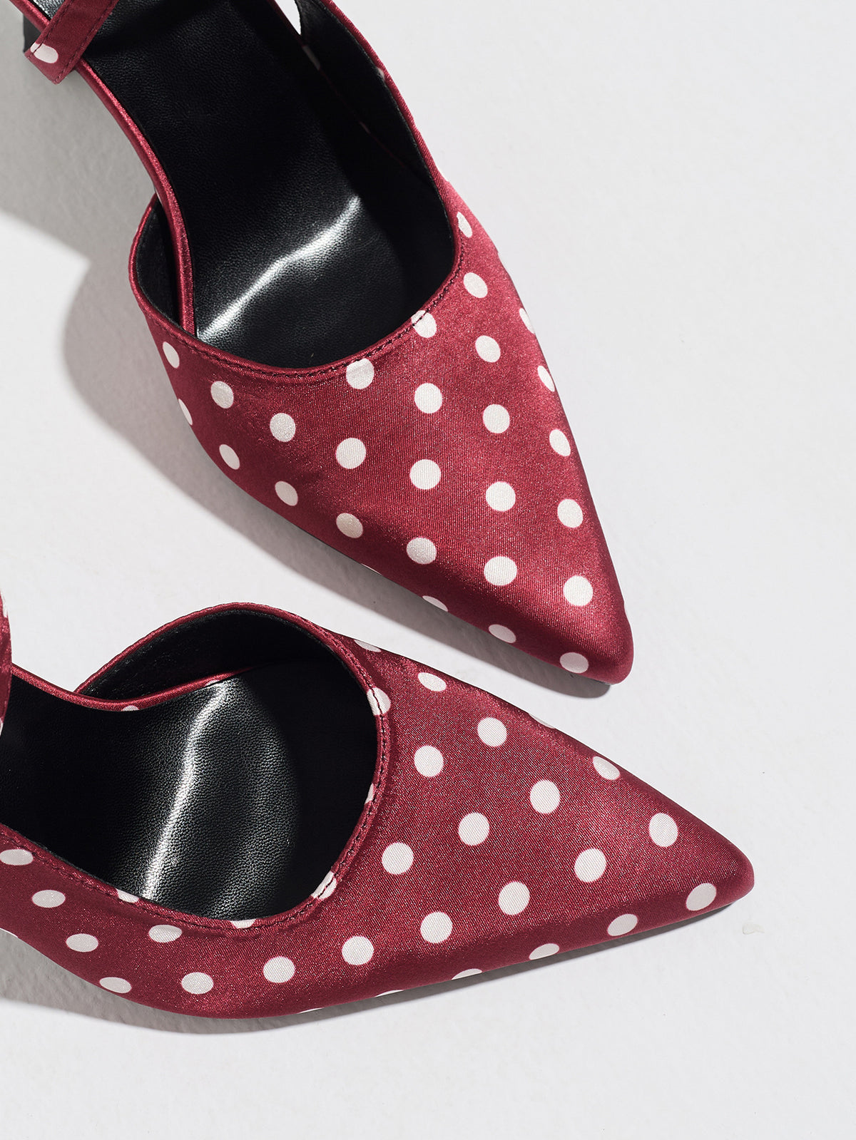 Mescini burgundy polka dot slingback heels, close view of the two pointed toes, US women's sizes