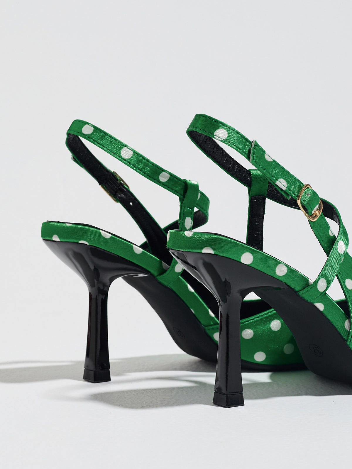 Mescini green polka dot slingback heels, rear view of the standing pair, US women's sizes