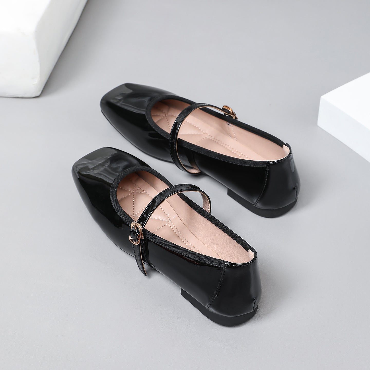 Mescini black patent square toe mary jane flats, pair overlapping, seen from above, US women's sizes