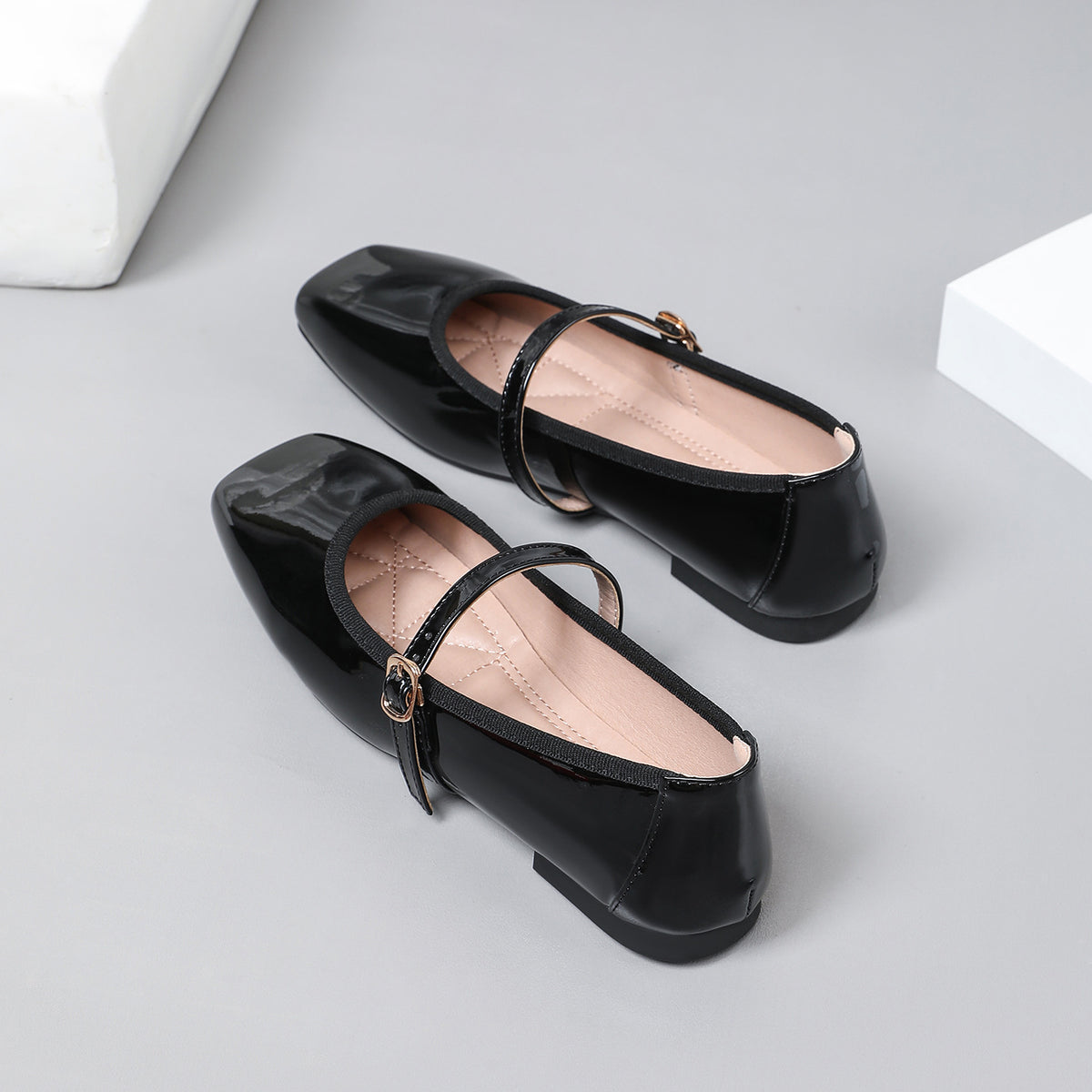 Mescini black patent square toe mary jane flats, pair overlapping, seen from above, US women's sizes
