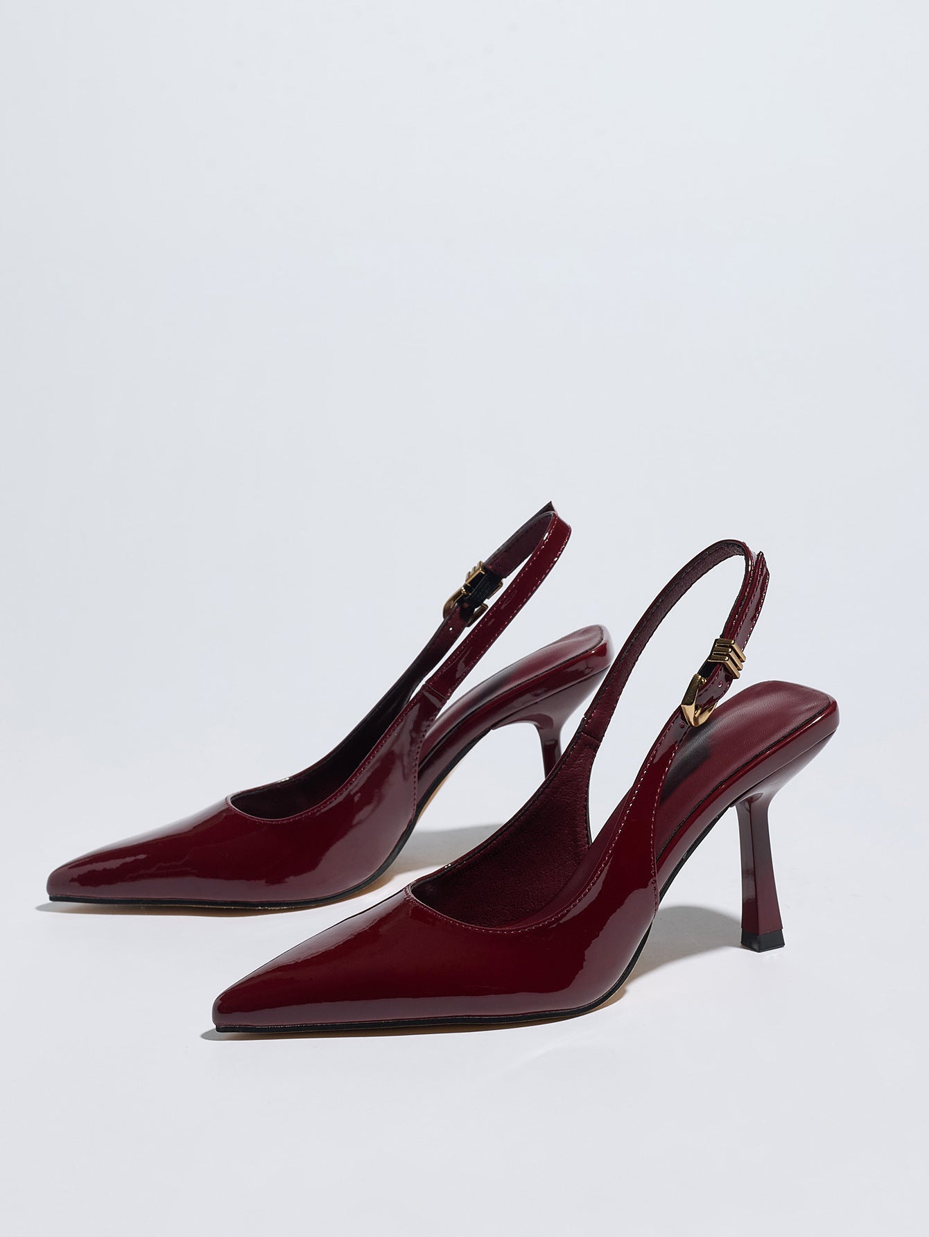 Mescini – Burgundy patent slingback pumps, angled studio pair on white, US women's sizes