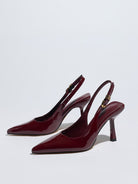 Mescini – Burgundy patent slingback pumps, angled studio pair on white, US women's sizes