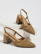 Mescini brown woven pointed toe block heel pumps, pair on white display risers, US women's sizes