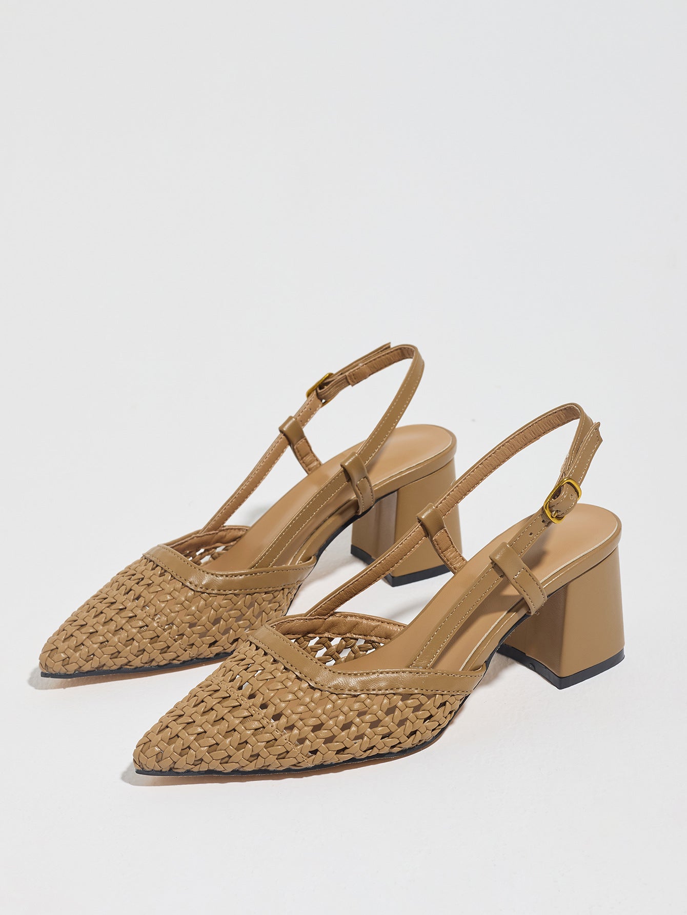 Mescini brown woven pointed toe block heel pumps, angled pair on a white floor, US women's sizes