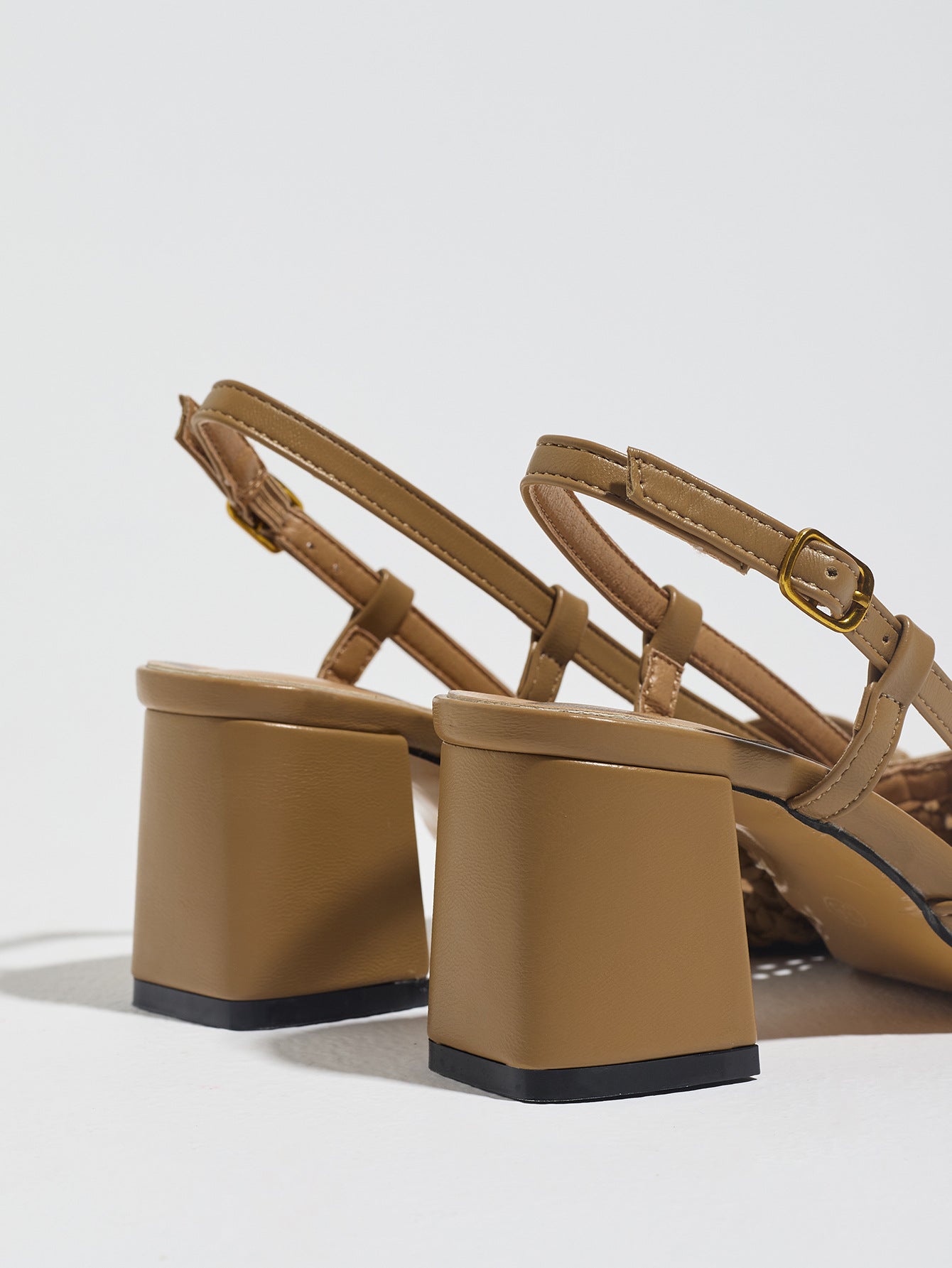 Mescini brown woven pointed toe pumps, rear view of the two block heels, US women's sizes