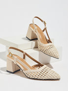 Mescini off-white woven pointed toe block heel pumps, pair on white risers, US women's sizes