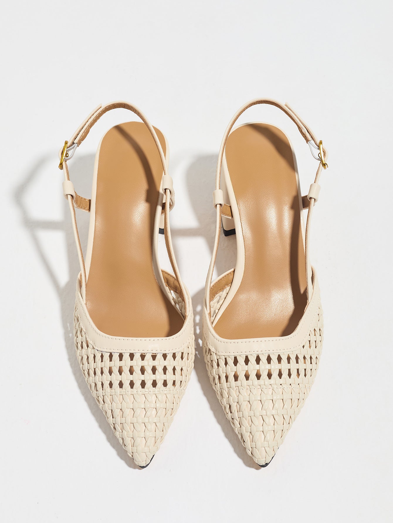 Mescini off-white woven pointed toe block heel pumps, pair seen from above, US women's sizes