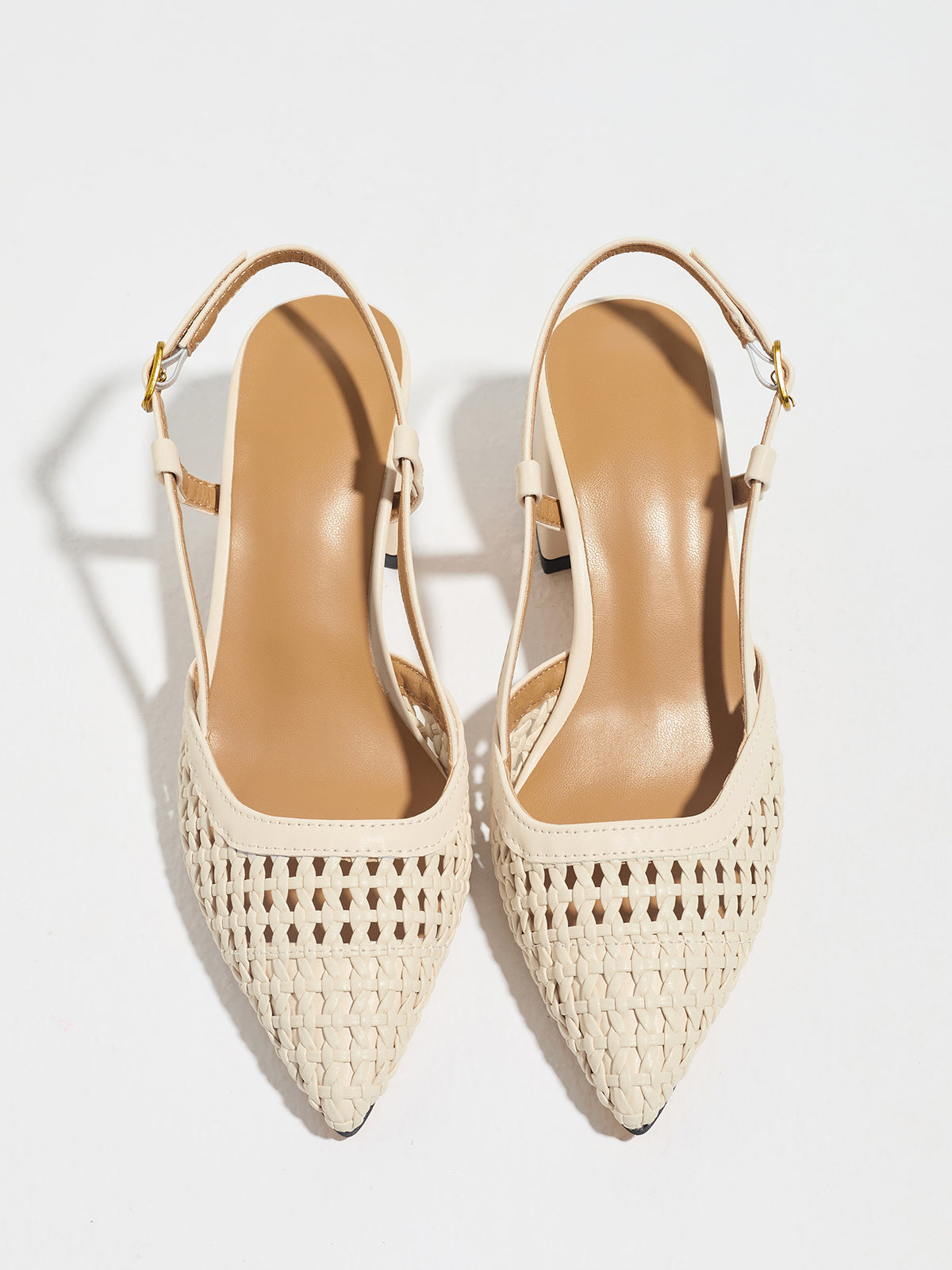 Mescini off-white woven pointed toe block heel pumps, pair seen from above, US women's sizes