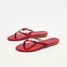 Mescini - Red toe post sandals angled pair view with side buckle, US women's sizes
