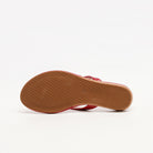Mescini red toe post low heel slide sandals, one shoe tipped up to show the tan sole, US women's sizes