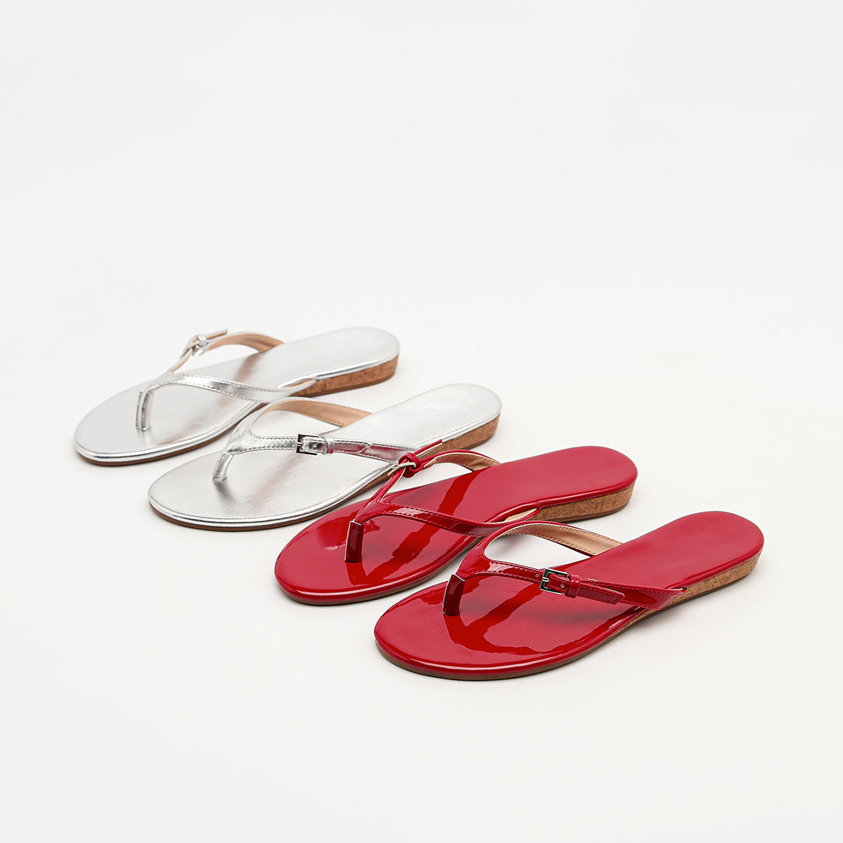 Mescini - Silver and red toe post slide sandals side by side on white, US women's sizes