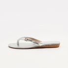 Mescini silver toe post low heel slide sandals, a single shoe seen from the side, US women's sizes