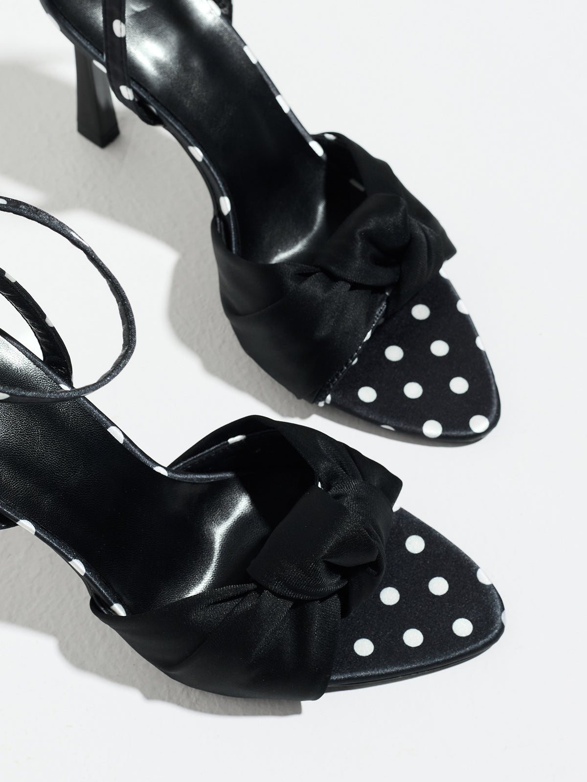 Mescini black knot front polka dot heeled sandals, close up of the knotted toe band, US women's sizes
