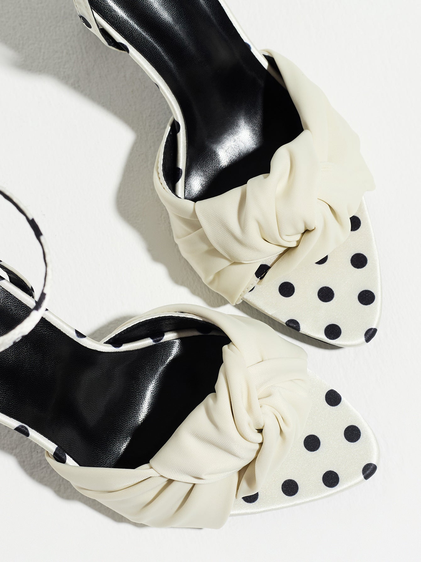 Mescini white knot front polka dot heeled sandals, close up of the band and the vamp print, US women's sizes