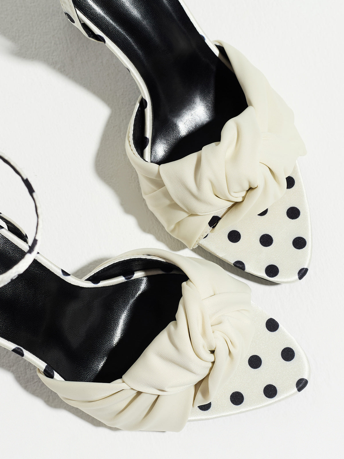 Mescini white knot front polka dot heeled sandals, close up of the band and the vamp print, US women's sizes