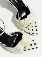 Mescini white knot front polka dot heeled sandals, close up of the band and the vamp print, US women's sizes