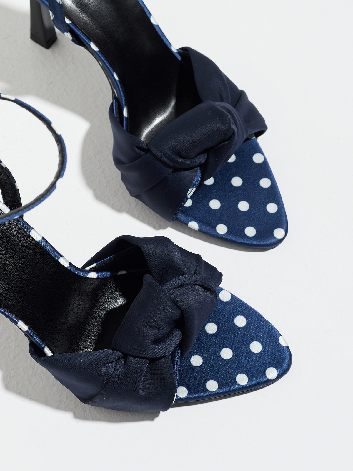 Mescini navy knot front polka dot heeled sandals, close up of the twisted band and toe, US women's sizes